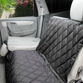 Dog Rear Seat Cover for Fold Down Seats - Hammock, Black Regular | Heavy-duty split design fits 60/40 and 50/50 fold-down seats. K9-Shield waterproof protection and a non-slip backing.